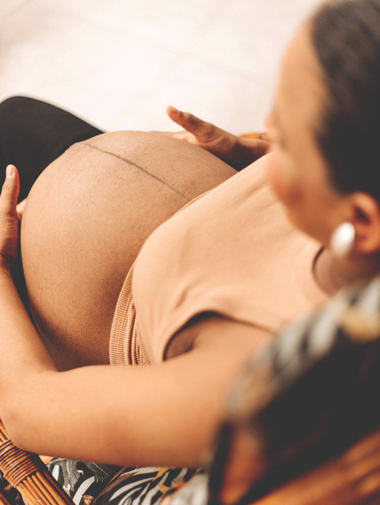 pregnant woman's belly from above